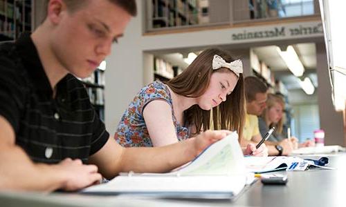 students studying in reading room 